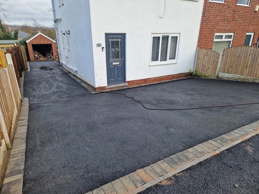 Driveways project — Machine laid tarmac driveway finished with a block paved border.